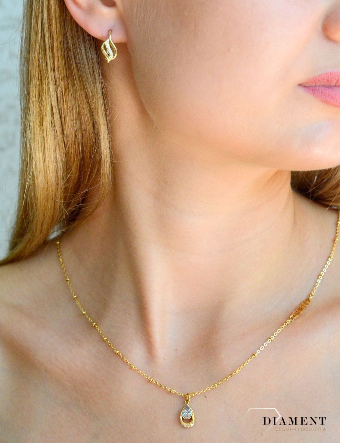 Złote kolczyki damskie 375 z pasmem białych cyrkonii KL 9972A 375.jpg